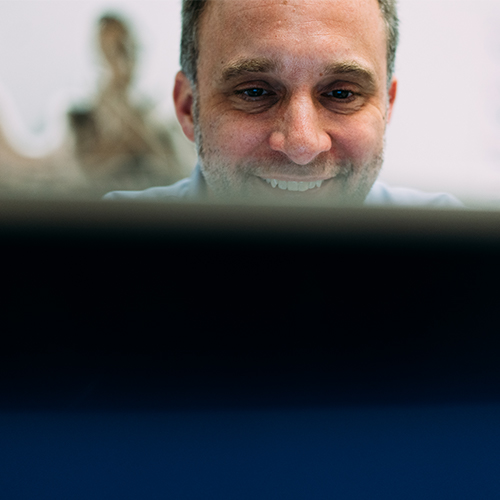 Business decision maker enjoys B2B marketing videos